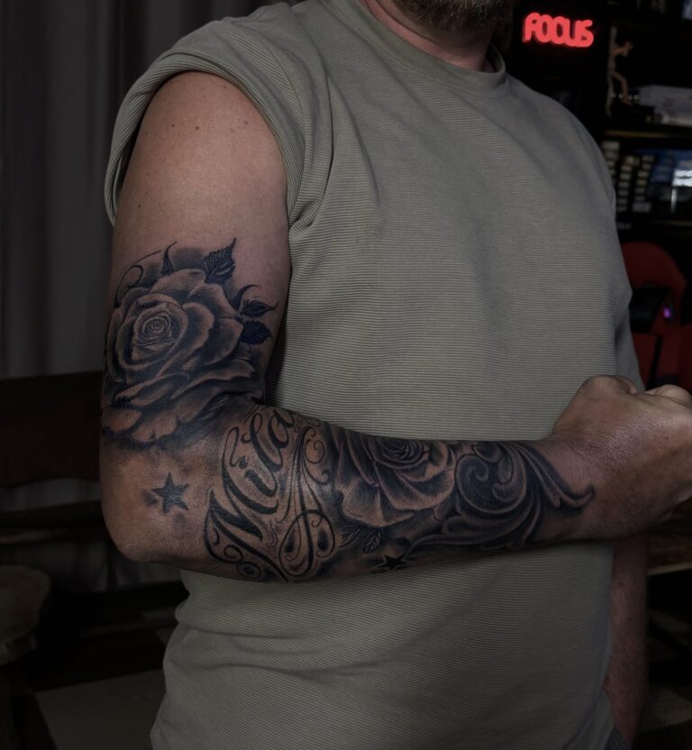 Rose and filigree black and grey full sleeve tattoo – Hurghada tattoo studio