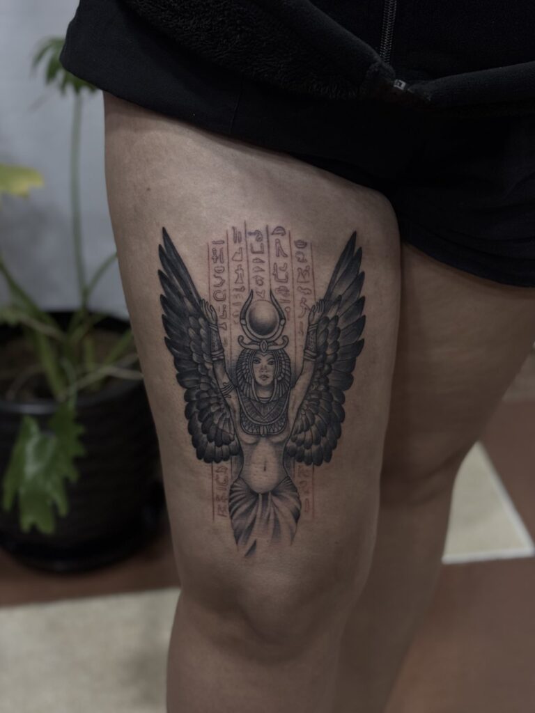 Winged scarab with hieroglyphs thigh tattoo – Egyptian style, DR G Tattoo